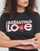 Abbigliamento Donna T-shirt maniche corte Converse RADIATING LOVE SS CLASSIC GRAPHIC Nero