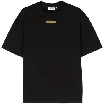 Abbigliamento Uomo T-shirt maniche corte Calvin Klein Jeans GRID LOGO COMFORT T-SHIRT Nero